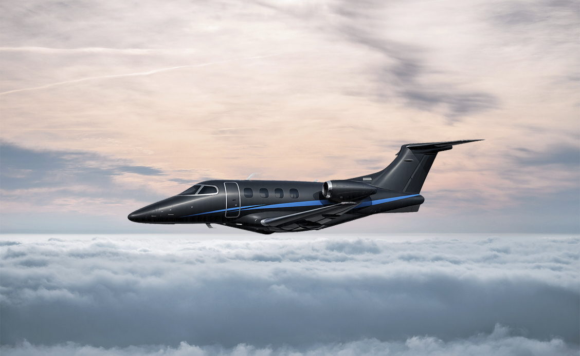 Embraer Phenom 100EV in flight