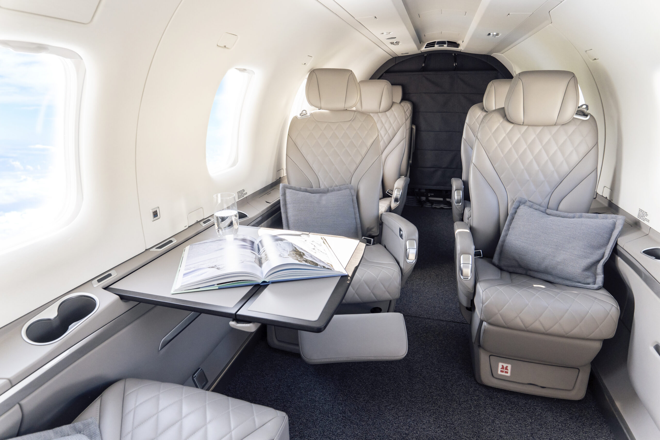 Pilatus PC-12 NGX – Comfort Across Europe Exclusive cabin of a Lohn Aviation Pilatus PC-12 NGX with light leather seats during a private flight within Europe.
